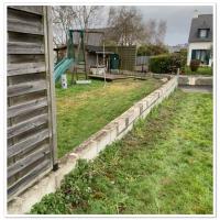 Réparation de muret plus panneaux de bois